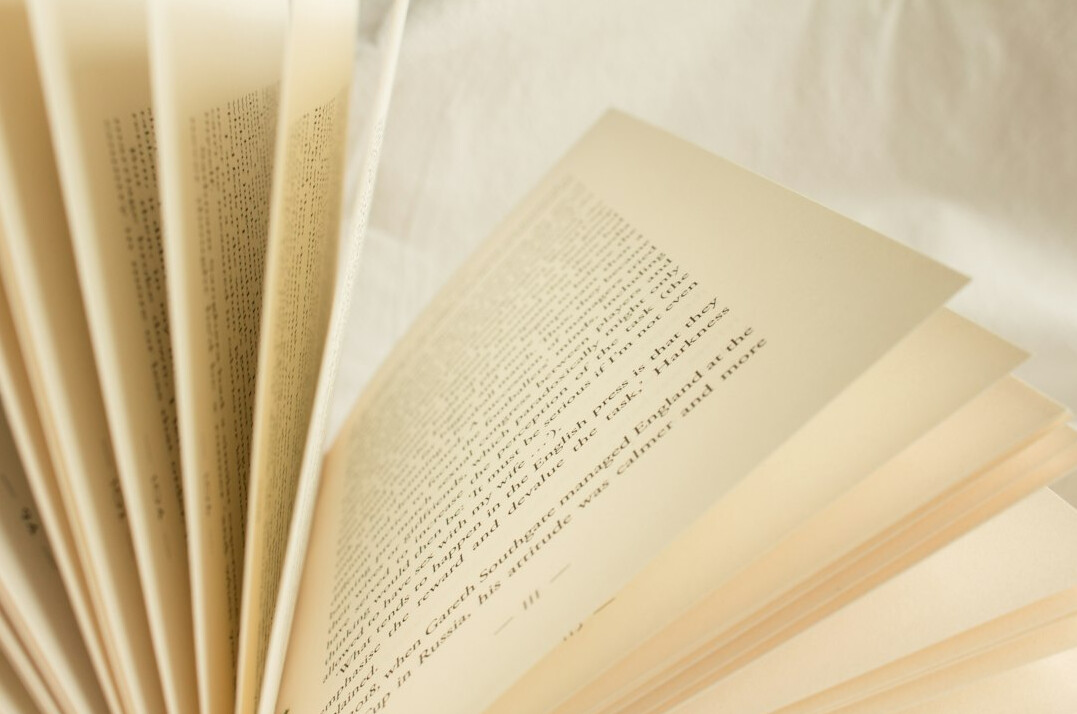 Close-up of book pages fanned out