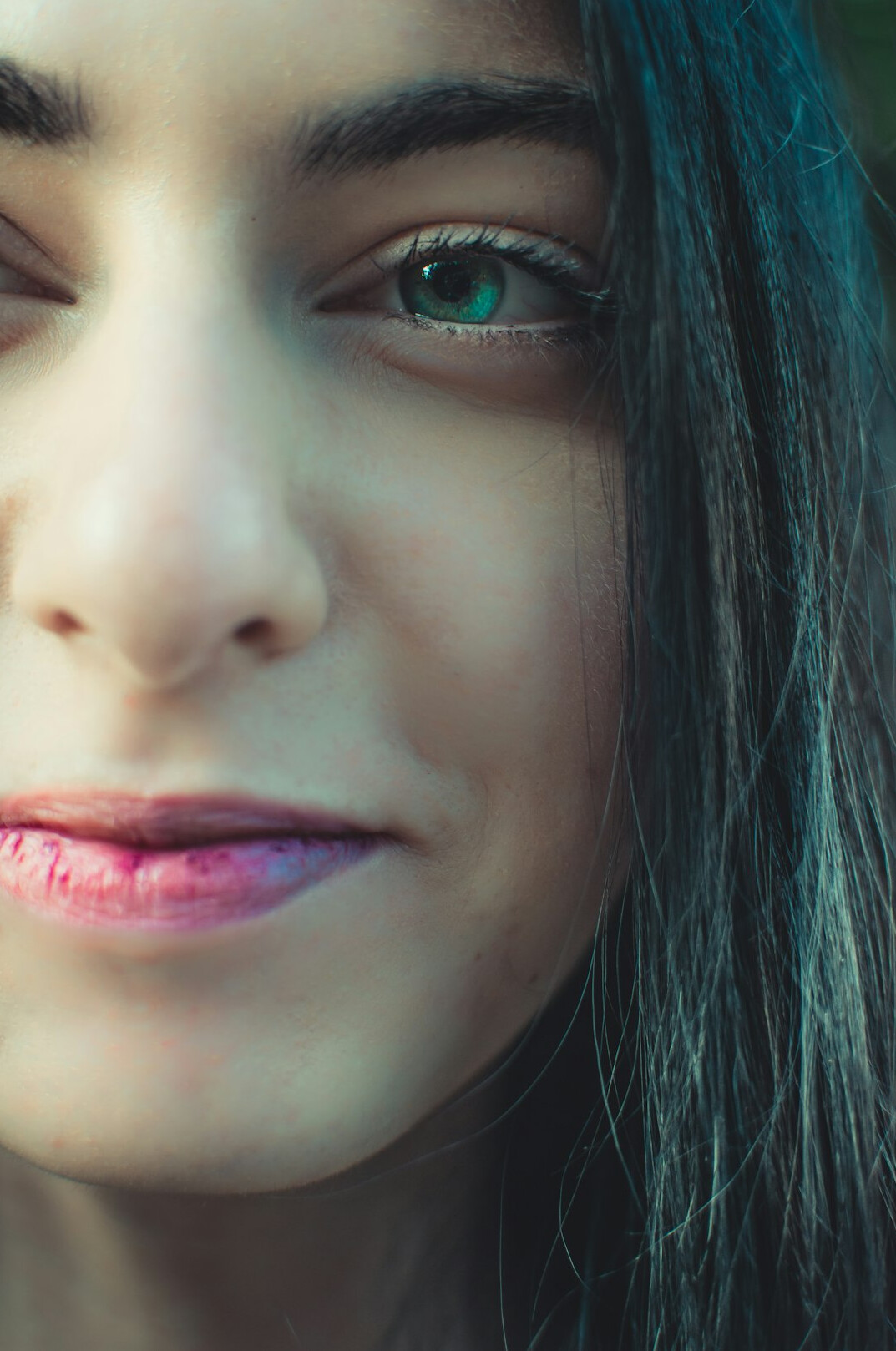 Portrait of a smiling woman with dark hair